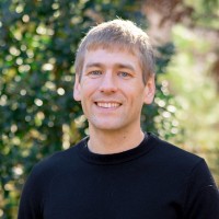 Travis May